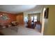 Spacious dining room with a glass-top dining table and seating for four at 2757 Via Cipriani # 1114A, Clearwater, FL 33764