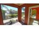 Enclosed patio with scenic water and community views at 2757 Via Cipriani # 1114A, Clearwater, FL 33764