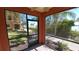 Enclosed patio with scenic water and community views at 2757 Via Cipriani # 1114A, Clearwater, FL 33764