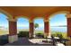 Waterfront gazebo with seating, offering scenic views at 2757 Via Cipriani # 1114A, Clearwater, FL 33764