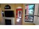 Bright living room with fireplace and water view at 2757 Via Cipriani # 1114A, Clearwater, FL 33764
