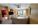 Living room with a cozy sectional sofa and a fireplace at 2757 Via Cipriani # 1114A, Clearwater, FL 33764