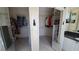 Large walk-in closet with ample shelving and hanging space at 2757 Via Cipriani # 1114A, Clearwater, FL 33764