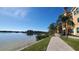 Brick pathway alongside waterfront, offering scenic views at 2757 Via Cipriani # 1114A, Clearwater, FL 33764