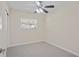 Spacious bedroom with ceiling fan and window blinds at 2765 57Th N St, St Petersburg, FL 33710