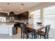 Cozy breakfast nook with wood table and chairs near kitchen at 30509 Pecan Valley Loop, Wesley Chapel, FL 33543