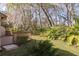 Deck and private backyard with lush landscaping at 3985 Mermoor Dr, Palm Harbor, FL 34685