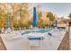 Inviting pool area with lounge chairs and tables at 3985 Mermoor Dr, Palm Harbor, FL 34685