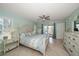 Spacious bedroom with a king-size bed and water views at 3998 South Cir, Largo, FL 33774