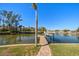 Private dock with boat lift and access to the water at 3998 South Cir, Largo, FL 33774