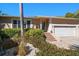 Charming single story home with landscaped yard and attached garage at 3998 South Cir, Largo, FL 33774