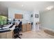 Home office with a desk, chairs, and ample storage at 3998 South Cir, Largo, FL 33774