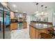 Modern kitchen featuring stainless steel appliances and granite countertops at 3998 South Cir, Largo, FL 33774