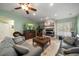 Spacious living area with fireplace and ample natural light at 3998 South Cir, Largo, FL 33774