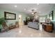 Bright living room with fireplace and large windows at 3998 South Cir, Largo, FL 33774