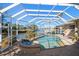 Relaxing pool and spa with screened enclosure at 3998 South Cir, Largo, FL 33774