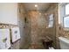 Large walk-in shower with tile surround at 3998 South Cir, Largo, FL 33774