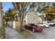 Townhouse exterior with parking in front at 409 S Audubon Ave # 9, Tampa, FL 33609