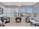 Sunroom with ample natural light and workspace at 5020 Brittany S Dr # 123, St Petersburg, FL 33715