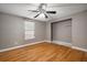 Bedroom displaying updated flooring, a closet, and a window at 505 Emberwood Dr, Brandon, FL 33511