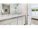 Clean bathroom with double vanity and a spacious shower at 6963 Broad River Ave, Land O Lakes, FL 34638