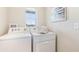 Convenient laundry room with washer and dryer at 6963 Broad River Ave, Land O Lakes, FL 34638