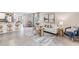 Open living room featuring a comfy sofa and stylish coffee table at 6963 Broad River Ave, Land O Lakes, FL 34638