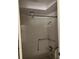 Bathroom with shower and grab bars at 7314 Patio Row, Hudson, FL 34667