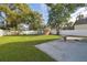 Large backyard with grassy area and detached shed at 810 E Conover St, Tampa, FL 33603