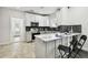 Modern kitchen with stainless steel appliances and white cabinets at 810 E Conover St, Tampa, FL 33603