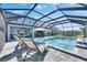 Spacious pool and patio area with lounge chairs at 8408 Abalone Loop, Parrish, FL 34219