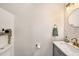 Modern bathroom with marble countertop and geometric tile at 8729 Sheldon Creek Blvd, Tampa, FL 33615