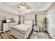 Spacious bedroom with wood-look floors and ample closet space at 8729 Sheldon Creek Blvd, Tampa, FL 33615