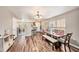 Dining area with a table and bench seating, kitchen view at 8729 Sheldon Creek Blvd, Tampa, FL 33615