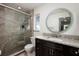 Updated bathroom with granite vanity and a large shower at 9372 121St St, Seminole, FL 33772