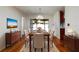 Elegant dining room with hardwood floors and a chandelier at 9372 121St St, Seminole, FL 33772