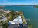 Waterfront property showcasing expansive water views and private dock at 981 Bay Esplanade, Clearwater Beach, FL 33767