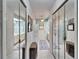 Double vanity bathroom with mirrored closets at 10020 Kenda Dr, Riverview, FL 33578
