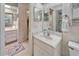 Guest bathroom with vanity and shower at 10020 Kenda Dr, Riverview, FL 33578