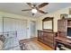 Bedroom with a daybed, dresser, and built-in closet at 10020 Kenda Dr, Riverview, FL 33578