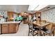 Kitchen with granite island and breakfast bar at 10020 Kenda Dr, Riverview, FL 33578