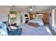 Main bedroom with comfy seating and large window at 10020 Kenda Dr, Riverview, FL 33578