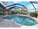 Relaxing screened pool and spa with brick pavers at 10020 Kenda Dr, Riverview, FL 33578