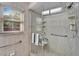 Walk in shower with grab bars and seat at 10020 Kenda Dr, Riverview, FL 33578
