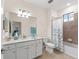 Clean bathroom, featuring a bathtub, toilet and vanity at 10043 Crooked Creek Dr # 202, Venice, FL 34293