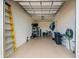 Garage with storage shelving and ample space at 10043 Crooked Creek Dr # 202, Venice, FL 34293