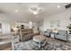 Spacious living room with a neutral color palette and comfortable seating at 10043 Crooked Creek Dr # 202, Venice, FL 34293