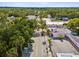 Aerial view of a tree-lined street in a quiet town at 1055 Philippe Pkwy, Safety Harbor, FL 34695