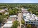 Aerial of tree-lined street, showcasing homes and businesses at 1055 Philippe Pkwy, Safety Harbor, FL 34695