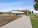 Covered picnic area with tables and a walkway at 1055 Philippe Pkwy, Safety Harbor, FL 34695